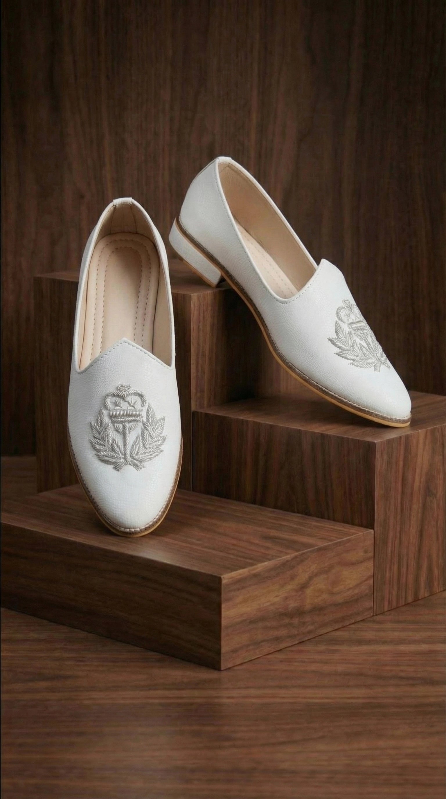 Ivory Textured Mojdi Shoes with Silver Crest Embroidery | Dresswala NX