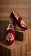 Maroon Velvet Mojdi Shoes with Gold Crest Embroidery | Dresswala NX