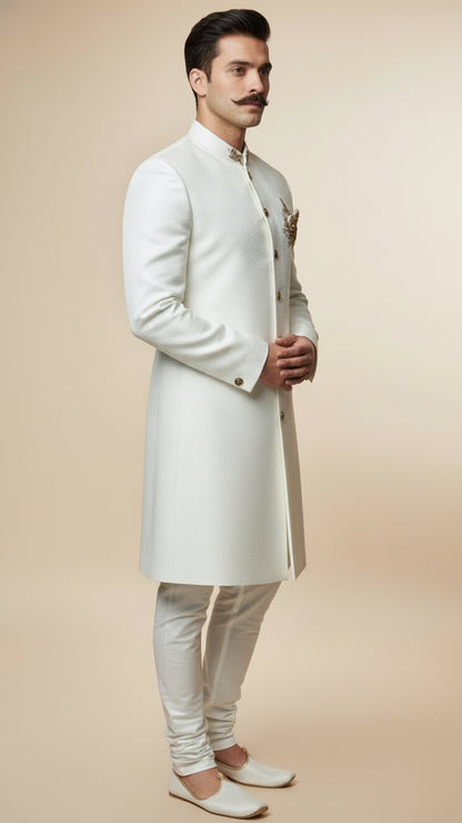 Ivory Textured Indo-Western Sherwani with Antique Buttons & Hand-Embroidered Crest